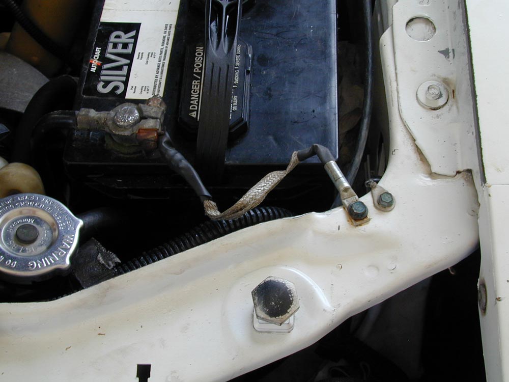 Battery front mount grounding Mustang